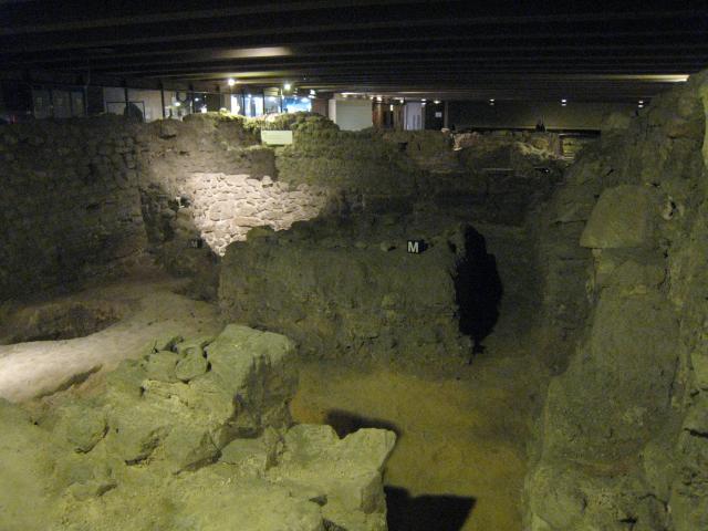 Archeological digs near Notre Dame cathedral, showing old building foundations.
