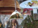 Afternoon libations at an outdoor cafe.  Randy had fun photographing the optical illusion of Katharina in a wine glass.