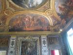 Many of the ceilings in the main palace at Versailles look like this... covered with detailed paintings.