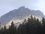 Sunlight shining on craggy mountaintops, Icefields Parkway.