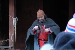 130_Norway_-_Gudvangen_-Viking_Village_tour_guide_-_combing_wool.jpg