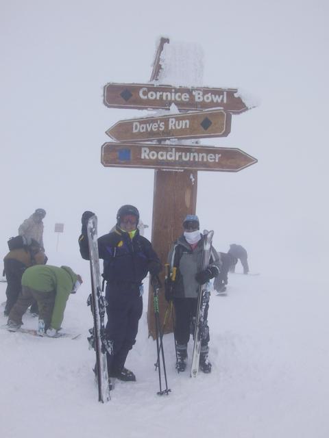 Tony and Vivian in whiteout at the top of the mountain.