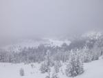 View of back side of mountain from Upper Road Runner, trying to get down out of the clouds.