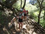Walking the bikes over rough terrain.