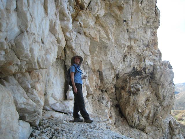On a ledge next to the mine wall.