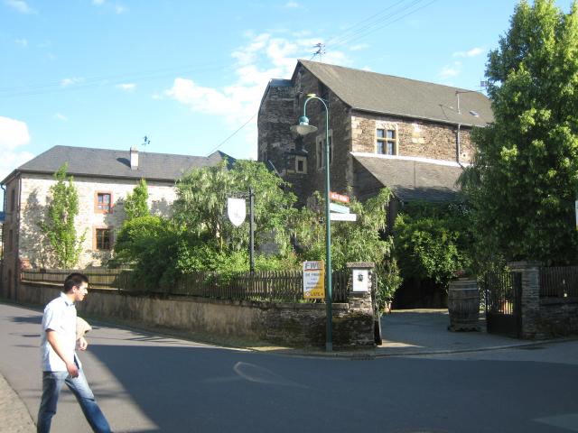 Max in front of an old church(?) building in Longuich.  The church tower was destroyed during WWII.