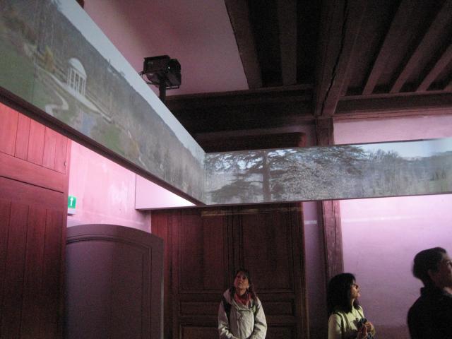 On the way to the Petit Trianon.  They had a square-screen video display, each side showing Versailles in a different season.