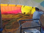 Filling the balloon with air.