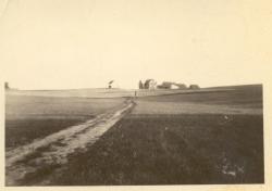 1930s:  Farm on hill.