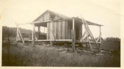 1935:  Martin shack being rebuilt on shore.