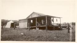 1936:  Martin shack with tent.