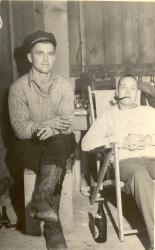 1940s:  Jock Knight and Claude Westerfall at shack.