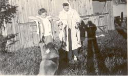 1941.  Nancy and Wanda Martin with Teddy the dog.