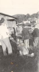 1945:  Group and Martin shack. Nancy, Bob, and Peter Dube.