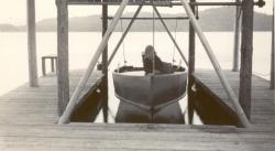 1948:  Bob Martin in boathouse with new boat.
