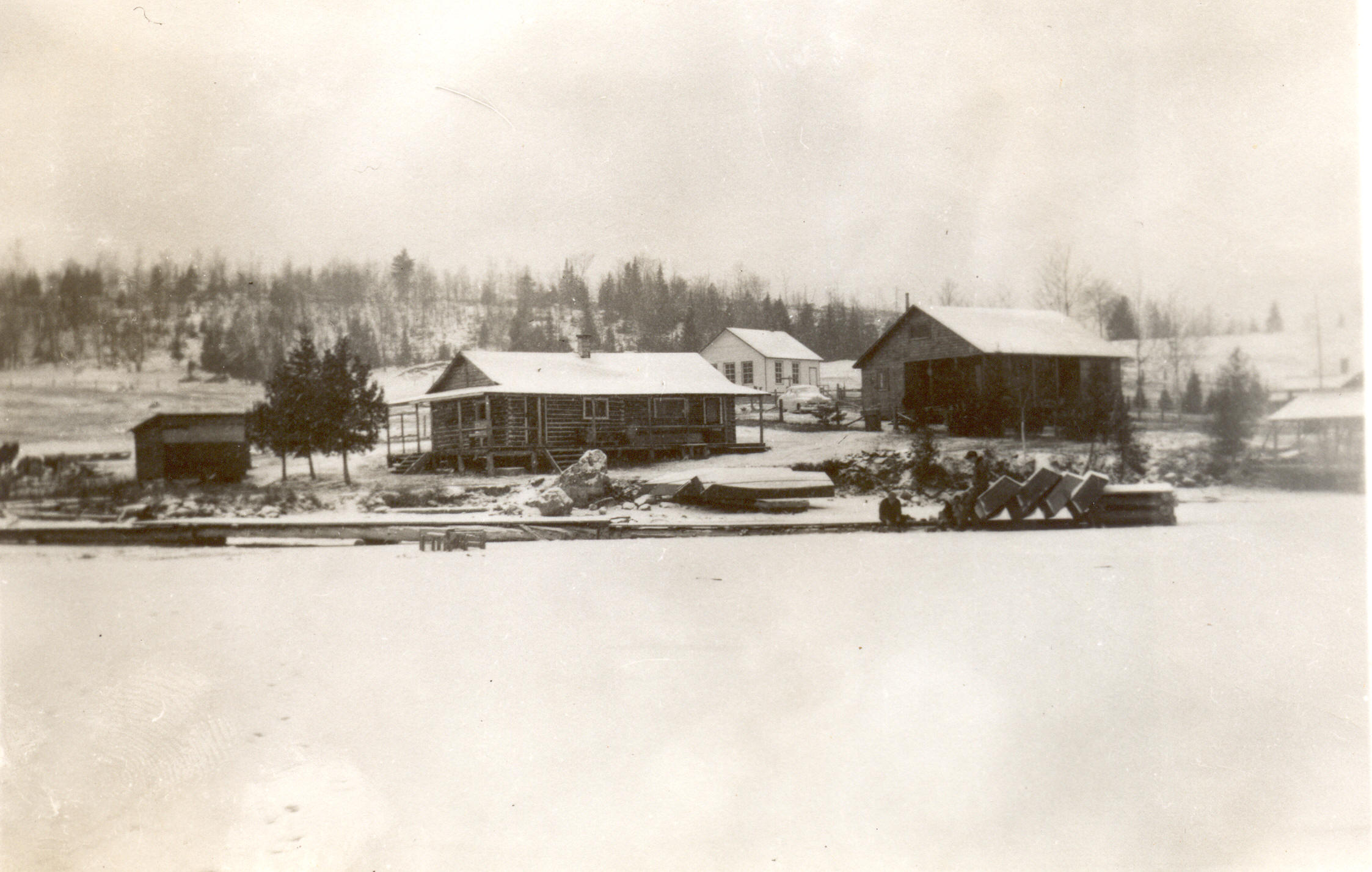 1951:  Winter view of the Phillips' place and the Martin's from lake