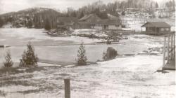 1957:  Don and Nancy barely visible on dock.