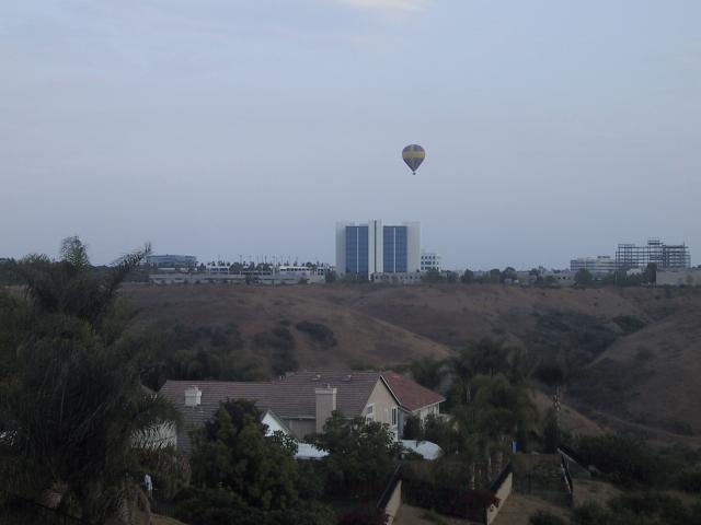 Watching a balloon take off - view from our backyard.