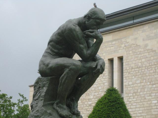 One of many "Thinker" statues that Rodin made.  The bird does not seem impressed with the statue, but Randy was!
